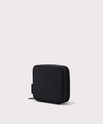 Dagne Dover small Arlo Tech Organizer in black seen from an angle.