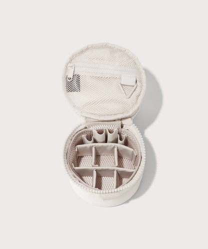 Dagne Dover small Mila Toiletry Pouch in white unzipped with the 6 adjustable compartments.