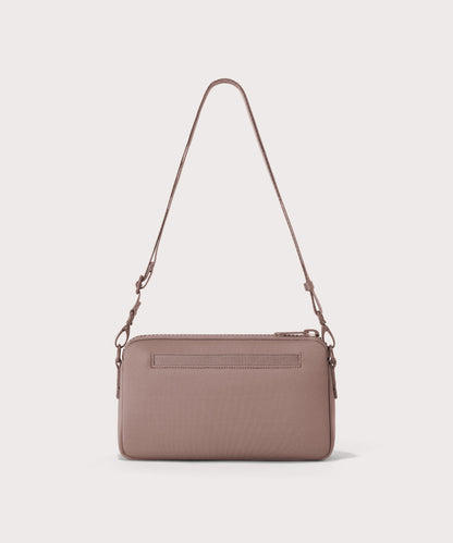 Dagne Dover Nora Shoulder Bag in pink, side angle.